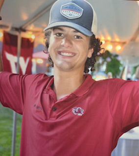 Nate in South Carolina shirt with huge smile